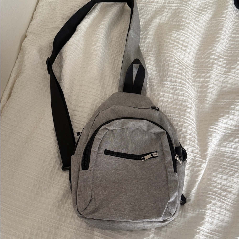 Grey cross body